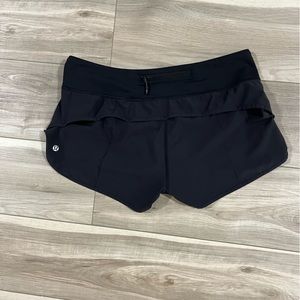 Lululemon black SPEED UP shorts.